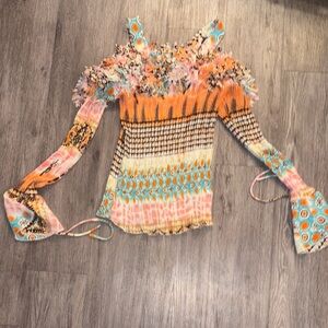 Vibrant Off-Shoulder Blouse with Ruffle Details